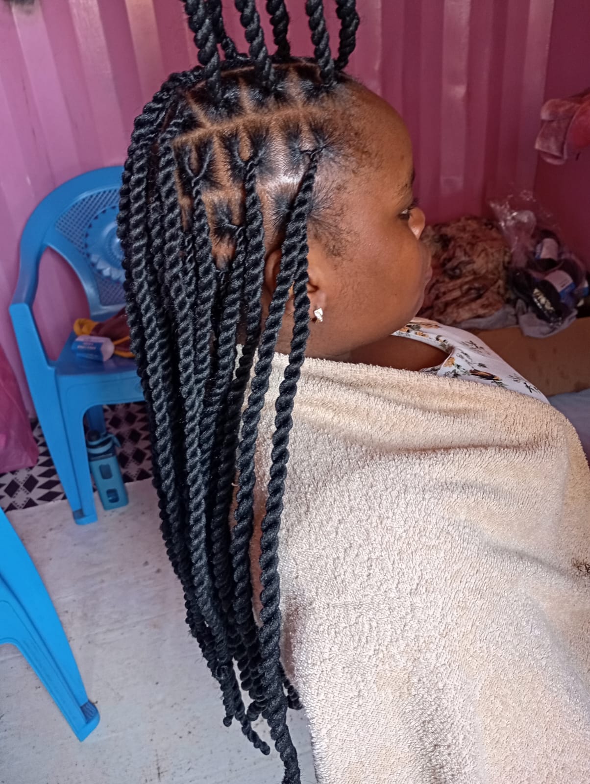 Invisible locs hairstyle by Blessed Rayna Salon